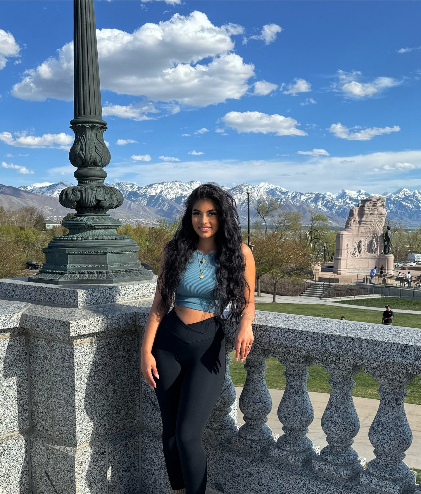 Brittany Boltinhouse standing in front of snow-capped mountains